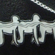 Illustration for article titled When you don't know how else to say it, say it with a Human Centipede necklace